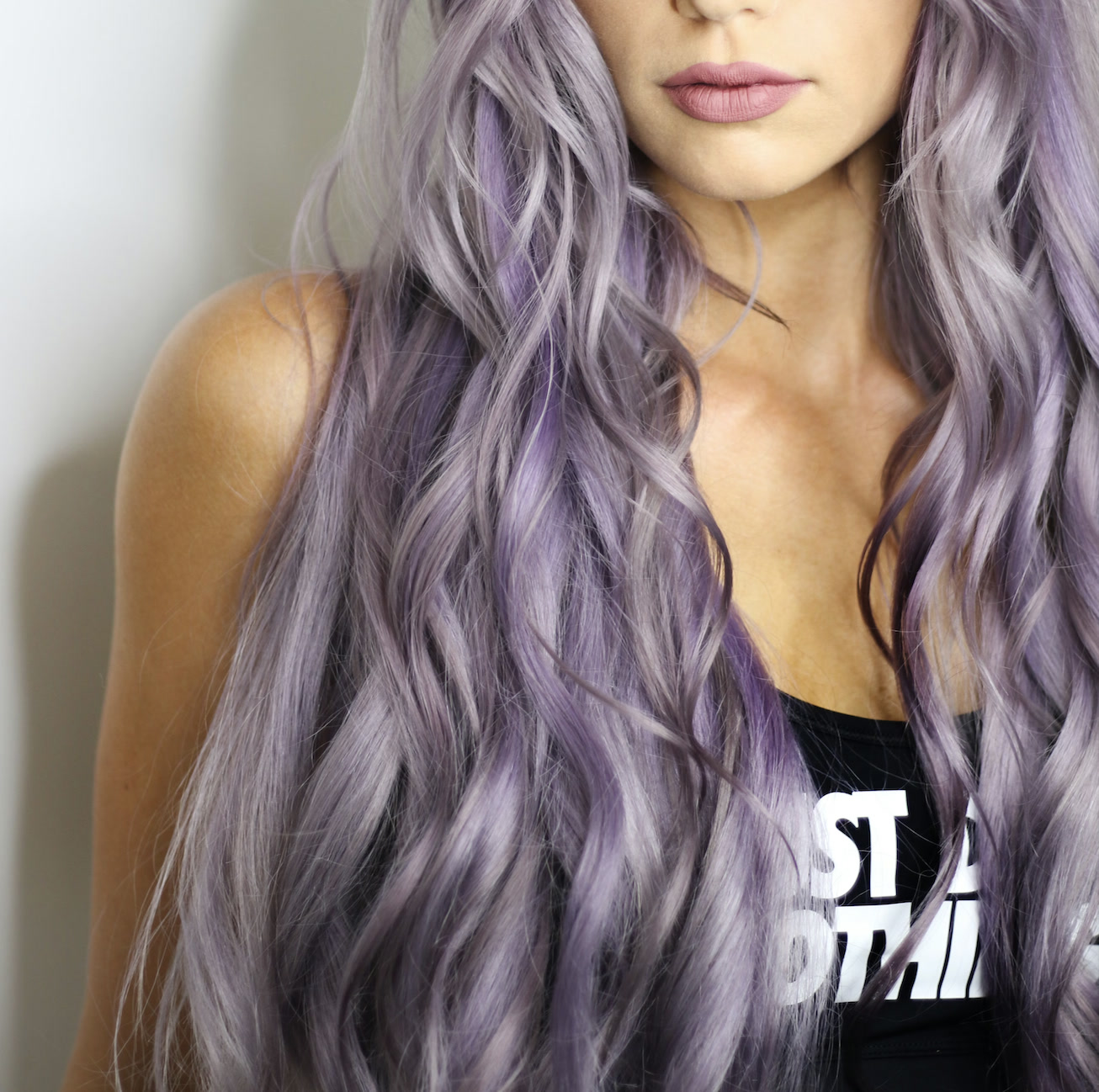 Glossy pastel color styled in soft waves